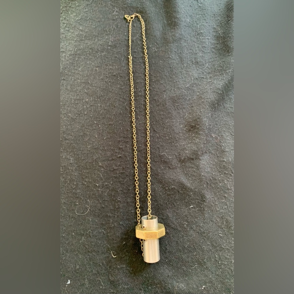 Funky gold necklace with hardware